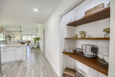 This beautifully updated villa, located in the highly on Heritage Ridge Golf Club in Florida - for sale on GolfHomes.com, golf home, golf lot