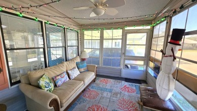 Welcome to paradise in this stunning 2-bedroom, 2-bathroom home on Blue Heron Pines Golf Course in Florida - for sale on GolfHomes.com, golf home, golf lot
