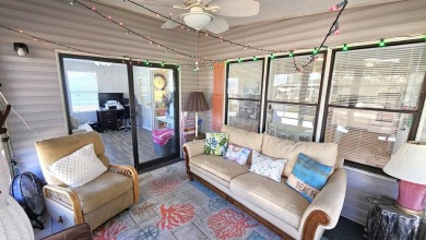 Welcome to paradise in this stunning 2-bedroom, 2-bathroom home on Blue Heron Pines Golf Course in Florida - for sale on GolfHomes.com, golf home, golf lot