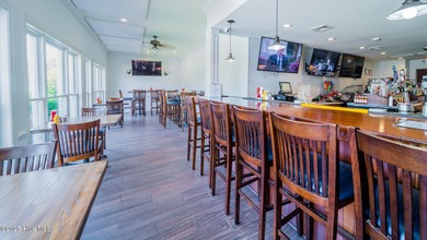 Over half an acre Golf Course Custom lot in the prestigious on Brunswick Plantation and Golf Resorts in North Carolina - for sale on GolfHomes.com, golf home, golf lot