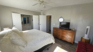 Welcome to paradise in this stunning 2-bedroom, 2-bathroom home on Blue Heron Pines Golf Course in Florida - for sale on GolfHomes.com, golf home, golf lot