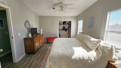 Welcome to paradise in this stunning 2-bedroom, 2-bathroom home on Blue Heron Pines Golf Course in Florida - for sale on GolfHomes.com, golf home, golf lot