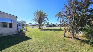 Welcome to paradise in this stunning 2-bedroom, 2-bathroom home on Blue Heron Pines Golf Course in Florida - for sale on GolfHomes.com, golf home, golf lot