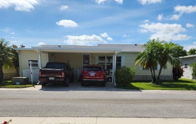 Large triple wide manufactured home located in Tall Oaks, a 55 on TPC At Treviso Bay in Florida - for sale on GolfHomes.com, golf home, golf lot