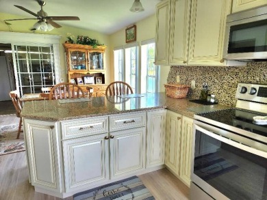 Large triple wide manufactured home located in Tall Oaks, a 55 on TPC At Treviso Bay in Florida - for sale on GolfHomes.com, golf home, golf lot