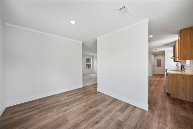 Cute as a button!!! This brand new home not is NOT in a flood on Bobcat Trail Golf Club in Florida - for sale on GolfHomes.com, golf home, golf lot