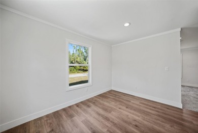 Cute as a button!!! This brand new home not is NOT in a flood on Bobcat Trail Golf Club in Florida - for sale on GolfHomes.com, golf home, golf lot