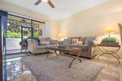 This highly desirable 2//2 bath, first floor CORNER END UNIT is on St. Petersburg Country Club in Florida - for sale on GolfHomes.com, golf home, golf lot