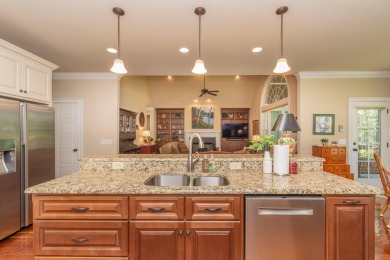 This beautiful home overlooks the Cupp  Course  fairway on Woodside Plantation Country Club in South Carolina - for sale on GolfHomes.com, golf home, golf lot