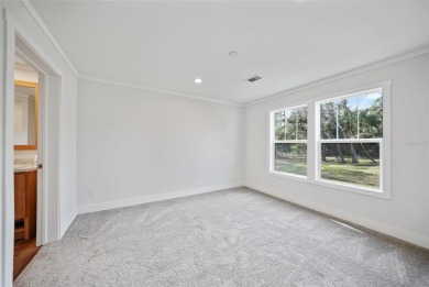 Cute as a button!!! This brand new home not is NOT in a flood on Bobcat Trail Golf Club in Florida - for sale on GolfHomes.com, golf home, golf lot