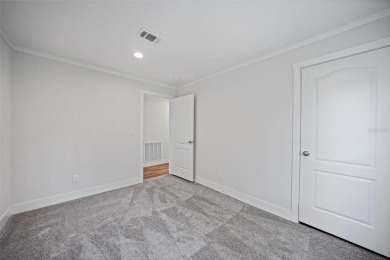 Cute as a button!!! This brand new home not is NOT in a flood on Bobcat Trail Golf Club in Florida - for sale on GolfHomes.com, golf home, golf lot