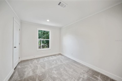 Cute as a button!!! This brand new home not is NOT in a flood on Bobcat Trail Golf Club in Florida - for sale on GolfHomes.com, golf home, golf lot