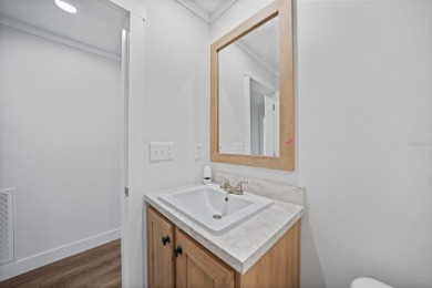 Cute as a button!!! This brand new home not is NOT in a flood on Bobcat Trail Golf Club in Florida - for sale on GolfHomes.com, golf home, golf lot