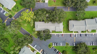 This highly desirable 2//2 bath, first floor CORNER END UNIT is on St. Petersburg Country Club in Florida - for sale on GolfHomes.com, golf home, golf lot