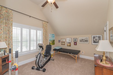 This beautiful home overlooks the Cupp  Course  fairway on Woodside Plantation Country Club in South Carolina - for sale on GolfHomes.com, golf home, golf lot