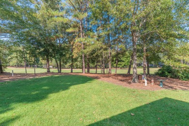 This beautiful home overlooks the Cupp  Course  fairway on Woodside Plantation Country Club in South Carolina - for sale on GolfHomes.com, golf home, golf lot
