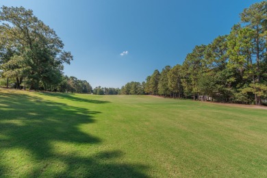 This beautiful home overlooks the Cupp  Course  fairway on Woodside Plantation Country Club in South Carolina - for sale on GolfHomes.com, golf home, golf lot