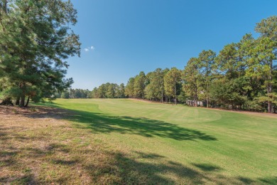 This beautiful home overlooks the Cupp  Course  fairway on Woodside Plantation Country Club in South Carolina - for sale on GolfHomes.com, golf home, golf lot