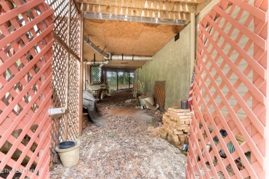 FAIRWAY VIEWS AND ENDLESS POTENTIAL IN TELLICO VILLAGE! on Toqua Golf Course - Loudon County in Tennessee - for sale on GolfHomes.com, golf home, golf lot