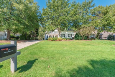 This beautiful home overlooks the Cupp  Course  fairway on Woodside Plantation Country Club in South Carolina - for sale on GolfHomes.com, golf home, golf lot