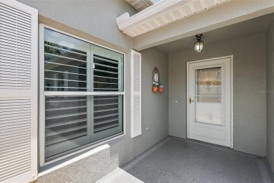 ABSOLUTELY STUNNING 3/2 BLOCK and STUCCO Foxglove courtyard on The Links of Spruce Creek in Florida - for sale on GolfHomes.com, golf home, golf lot