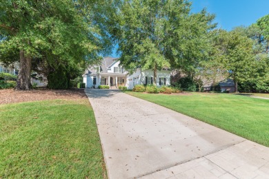 This beautiful home overlooks the Cupp  Course  fairway on Woodside Plantation Country Club in South Carolina - for sale on GolfHomes.com, golf home, golf lot