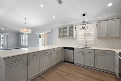 ABSOLUTELY STUNNING 3/2 BLOCK and STUCCO Foxglove courtyard on The Links of Spruce Creek in Florida - for sale on GolfHomes.com, golf home, golf lot