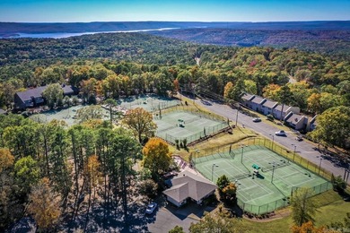 Welcome to this gorgeously remodeled Cliffside Lodge condo with on  in Arkansas - for sale on GolfHomes.com, golf home, golf lot