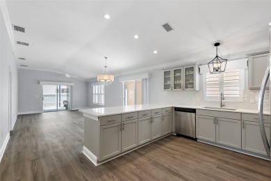ABSOLUTELY STUNNING 3/2 BLOCK and STUCCO Foxglove courtyard on The Links of Spruce Creek in Florida - for sale on GolfHomes.com, golf home, golf lot
