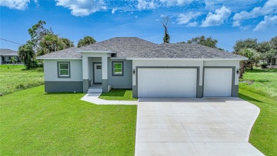 Welcome to this exceptional new 2024 construction coastal on Rotonda Golf and Country Club - Long Marsh  in Florida - for sale on GolfHomes.com, golf home, golf lot