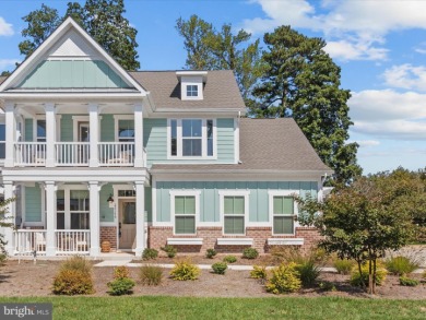 Welcome to 22179 Dune Circle, a stunning end-unit townhome in on The Peninsula Golf and Country Club in Delaware - for sale on GolfHomes.com, golf home, golf lot