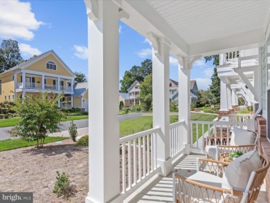 Welcome to 22179 Dune Circle, a stunning end-unit townhome in on The Peninsula Golf and Country Club in Delaware - for sale on GolfHomes.com, golf home, golf lot