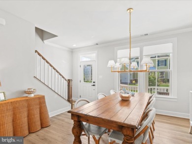 Welcome to 22179 Dune Circle, a stunning end-unit townhome in on The Peninsula Golf and Country Club in Delaware - for sale on GolfHomes.com, golf home, golf lot