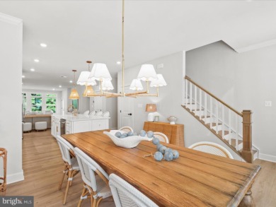 Welcome to 22179 Dune Circle, a stunning end-unit townhome in on The Peninsula Golf and Country Club in Delaware - for sale on GolfHomes.com, golf home, golf lot