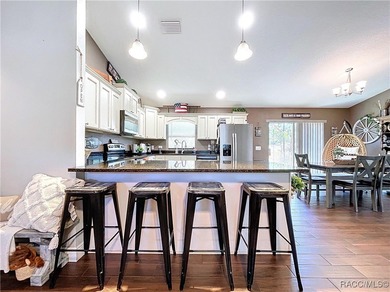 $5,000 in buyer closing cost assistance (with a full-price on Pine Ridge Community Golf and Country Club in Florida - for sale on GolfHomes.com, golf home, golf lot