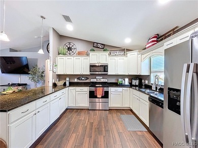 $5,000 in buyer closing cost assistance (with a full-price on Pine Ridge Community Golf and Country Club in Florida - for sale on GolfHomes.com, golf home, golf lot