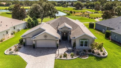 Golf Course  Pond Home For Sale in The Villages. A lot of great on The Links of Spruce Creek in Florida - for sale on GolfHomes.com, golf home, golf lot