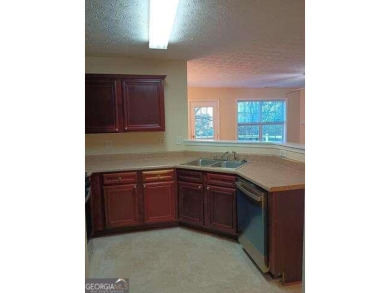 Beautifully renovated townhouse is the perfect home for a on Mystery Valley Golf Course in Georgia - for sale on GolfHomes.com, golf home, golf lot