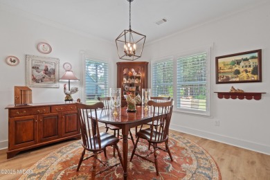 From the moment you arrive at this residence, you will know that on Canongate At Healy Point Country Club in Georgia - for sale on GolfHomes.com, golf home, golf lot
