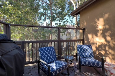 Welcome to this exquisite two-bedroom upstairs, end-unit in the on Tustin Ranch Golf Club in California - for sale on GolfHomes.com, golf home, golf lot