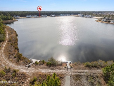 Rare Cardinal Lake Homesite with short walk to the amenities on Compass Pointe Golf Course in North Carolina - for sale on GolfHomes.com, golf home, golf lot