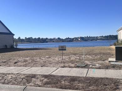 Rare Cardinal Lake Homesite with short walk to the amenities on Compass Pointe Golf Course in North Carolina - for sale on GolfHomes.com, golf home, golf lot