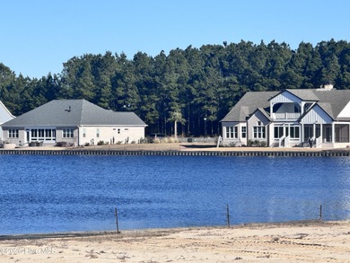 Rare Cardinal Lake Homesite with short walk to the amenities on Compass Pointe Golf Course in North Carolina - for sale on GolfHomes.com, golf home, golf lot