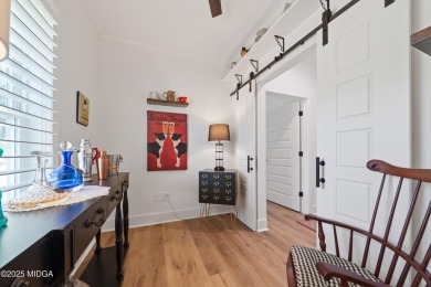 From the moment you arrive at this residence, you will know that on Canongate At Healy Point Country Club in Georgia - for sale on GolfHomes.com, golf home, golf lot