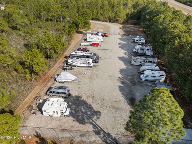 Rare Cardinal Lake Homesite with short walk to the amenities on Compass Pointe Golf Course in North Carolina - for sale on GolfHomes.com, golf home, golf lot