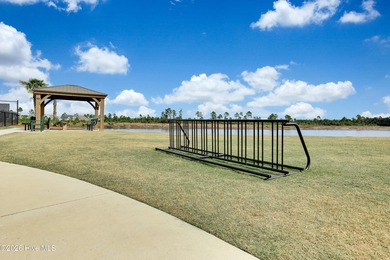 Rare Cardinal Lake Homesite with short walk to the amenities on Compass Pointe Golf Course in North Carolina - for sale on GolfHomes.com, golf home, golf lot