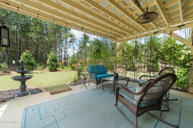 From the moment you arrive at this residence, you will know that on Canongate At Healy Point Country Club in Georgia - for sale on GolfHomes.com, golf home, golf lot