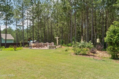 From the moment you arrive at this residence, you will know that on Canongate At Healy Point Country Club in Georgia - for sale on GolfHomes.com, golf home, golf lot