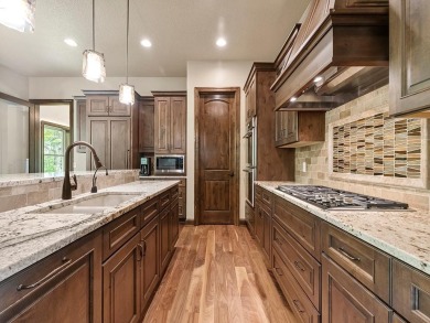 This custom-built, one-level home sits on 2.5 beautifully on Ridges At Sand Creek in Minnesota - for sale on GolfHomes.com, golf home, golf lot