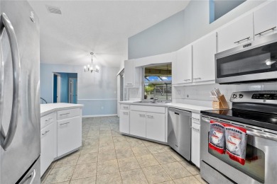 CORNER LOT! Spacious 3 bedroom, 2 bath, 2-car garage pool home on Pinemoor West Golf Club in Florida - for sale on GolfHomes.com, golf home, golf lot